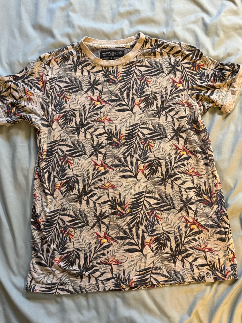 Free Planet Beige Short Sleeve Top with Black Leaf and Red Accent Print